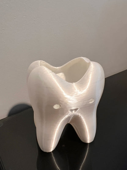 Crying tooth planter